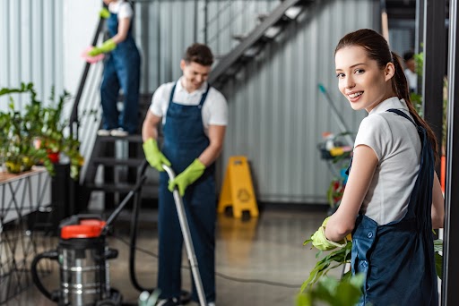 Team cleaning a room.